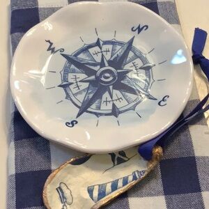 Nautical Blue and White Compass Plates with napkins and napkins rings.